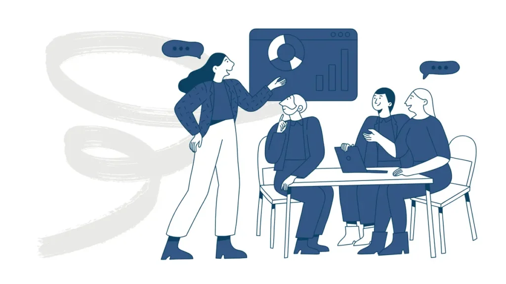 people sitting at a table with a chart on the wall